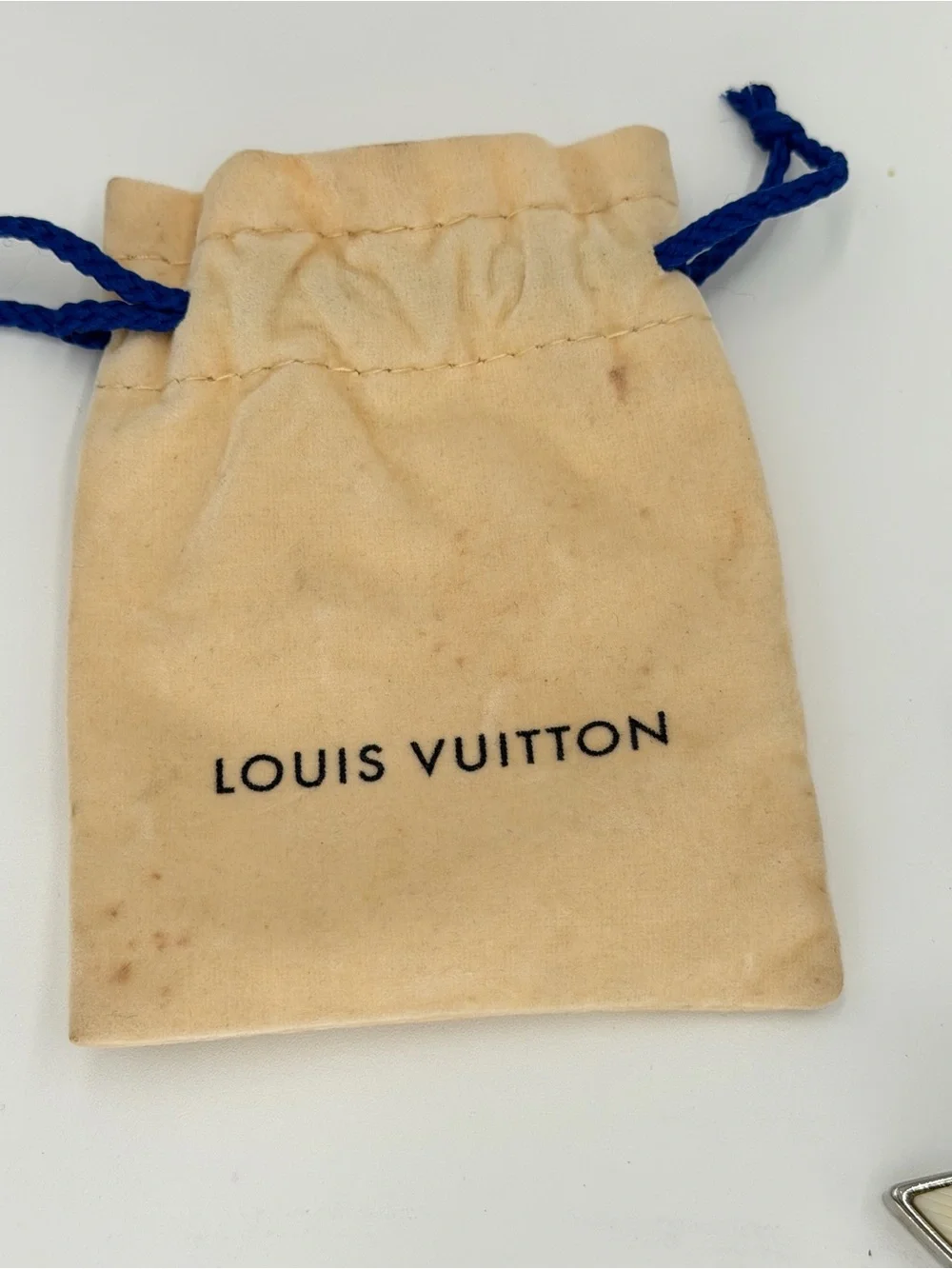 Authentic Louis Vuitton Fleur d’Epi Silver & Cream Bag Charm w/Dust Bag and COA
